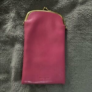 Kate spade coin pouch 7 1/2 inches from top to bottom and 4 inches!